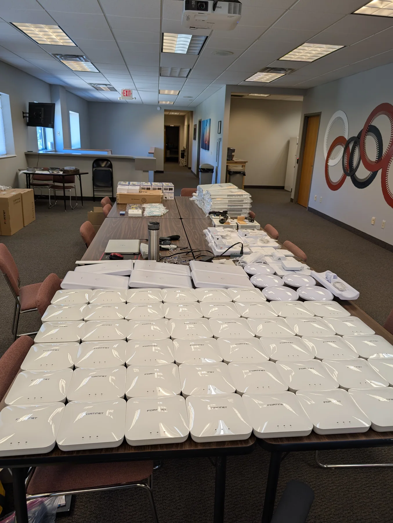 Staging at scale for multi-building infrastructure project